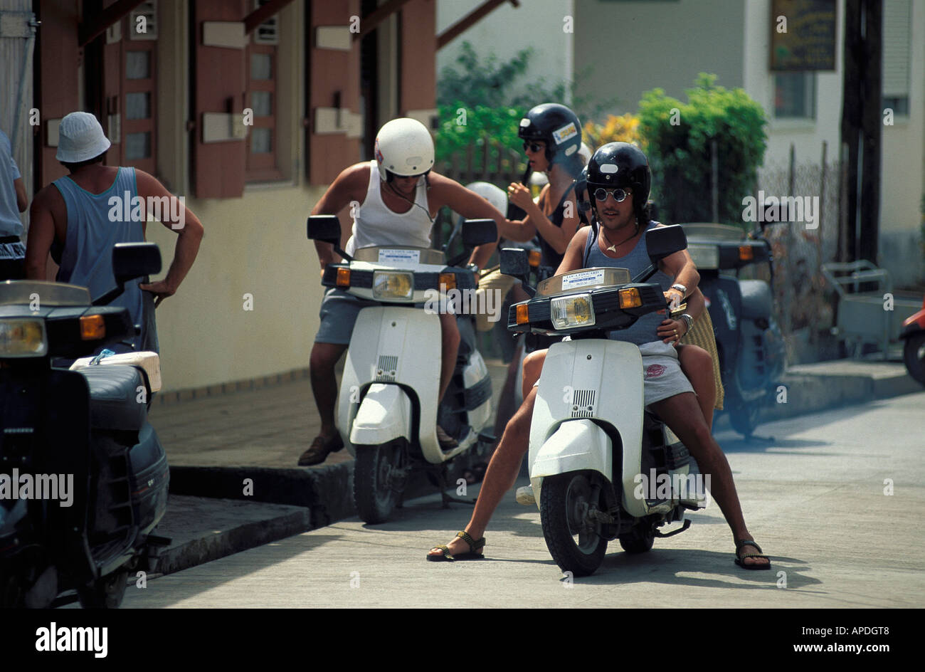 Scooter drivers, Iles de Saintes, Guadeloupe Caribbean, America Stock