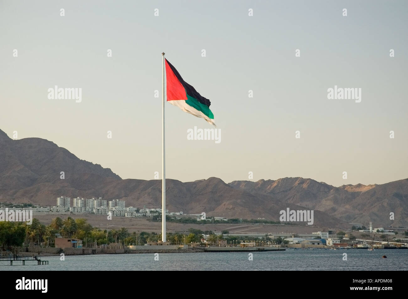 Huge flag flying over the Gulf of Aqaba, Hashemite Kingdom of Jordan, Middle East.  DSC_4798 Stock Photo
