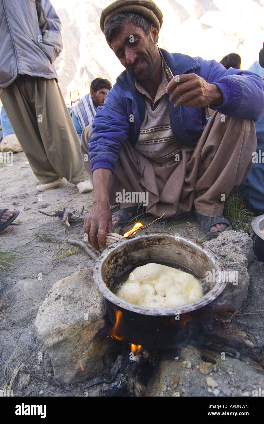 A Balti man making bread in Pakistan Stock Photo
