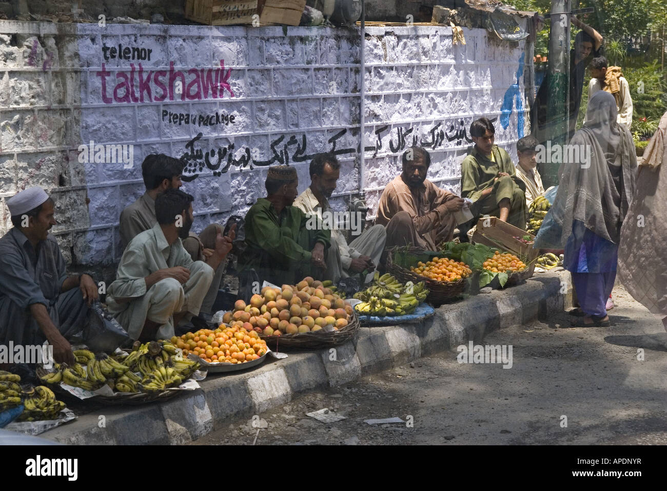 Fruit vendors on the side of the road in Islamabad in Pakistan Stock Photo