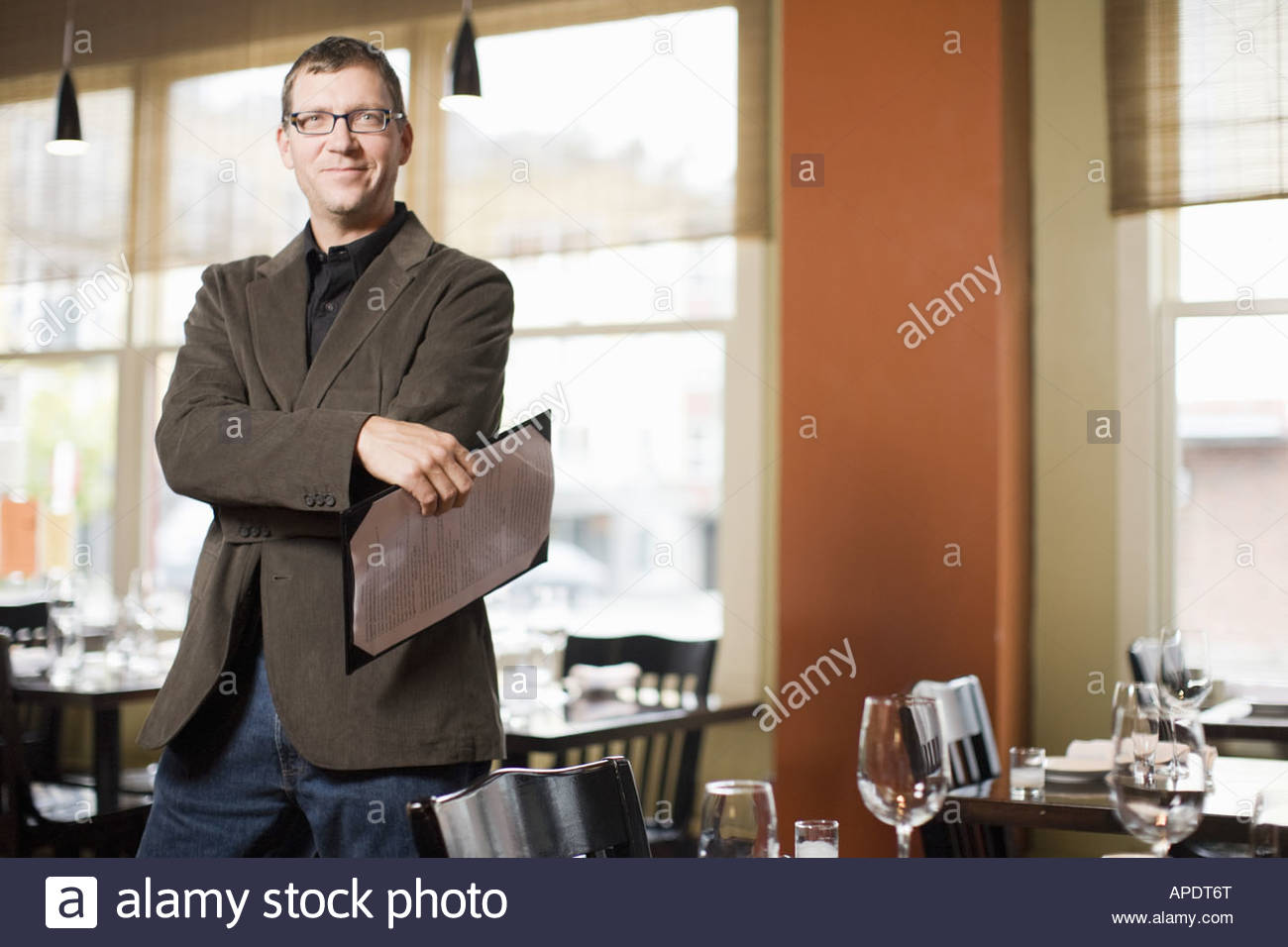 Maitre D Holding Menu In Restaurant Stock Photo 15760271 Alamy