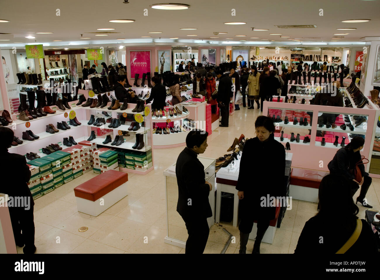 Shopping in upscale shopping mall on East Nanjing Road in Shanghai Stock Photo