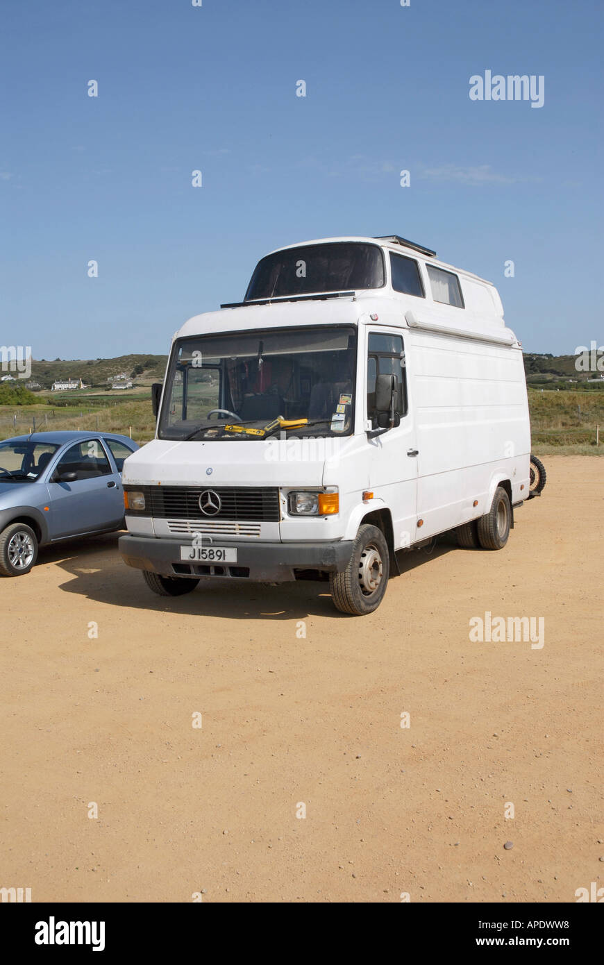 White Mercedes van with VW camper extension on the roof Stock Photo Alamy