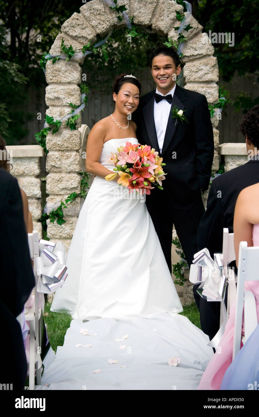 Bride and groom at altar hi-res stock photography and images - Alamy