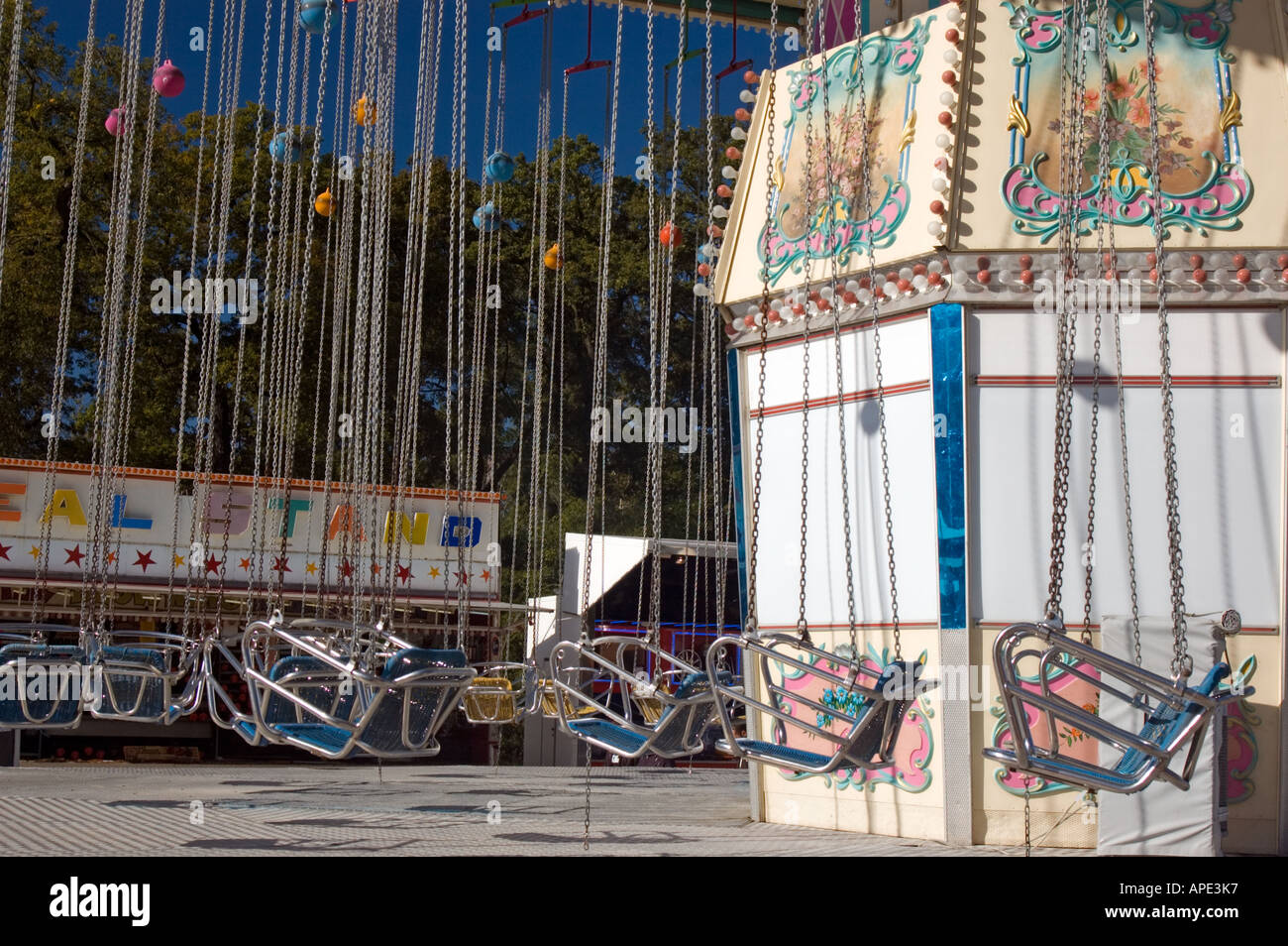 empty seats on a carousel Stock Photo