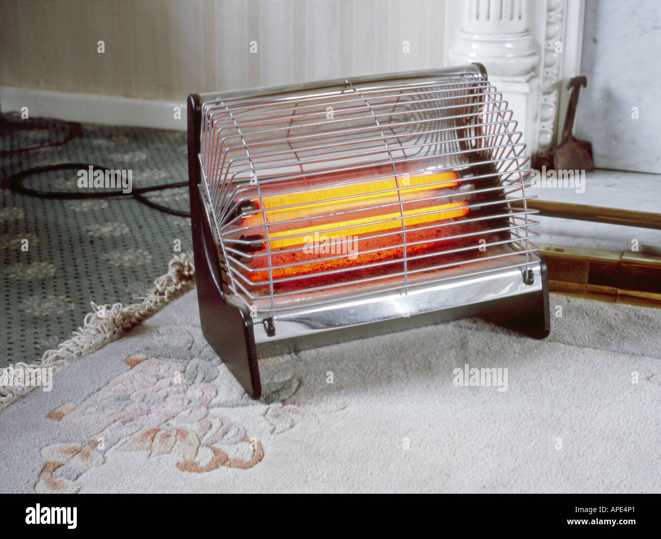 old fashioned electric bar radiator Stock Photo - Alamy