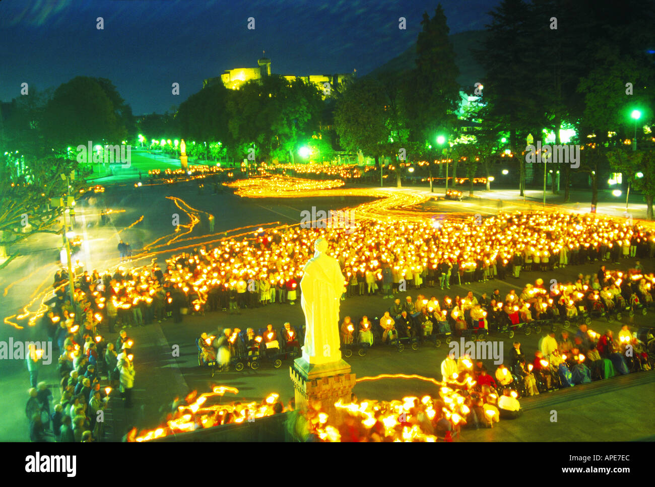 France Pyrenees Lourdes pilgrims candlelight procession to Mass Stock ...