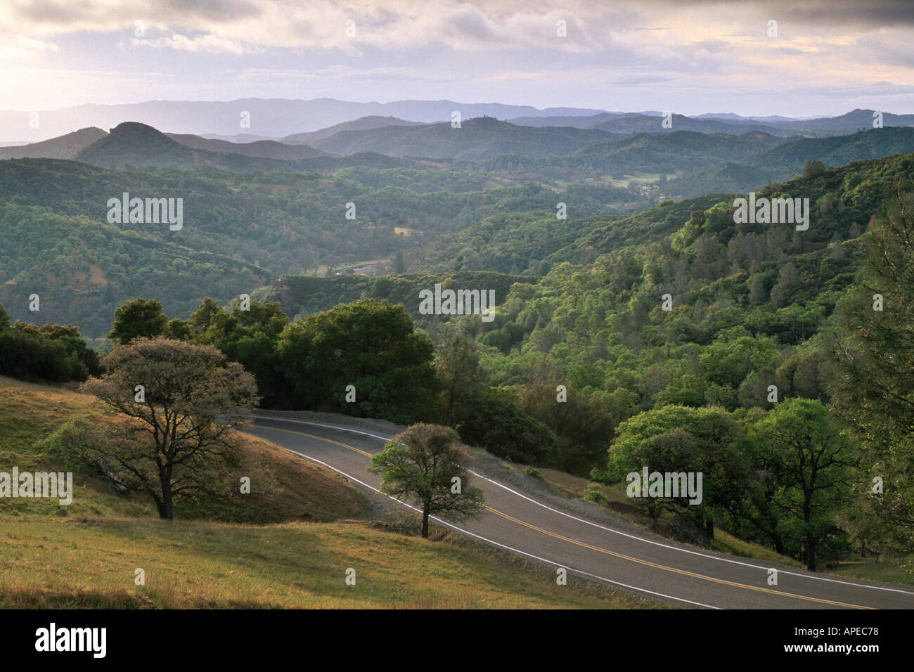 Two lane country road through rugged rural hills Mount Hamilton Santa Clara County California Stock Photo