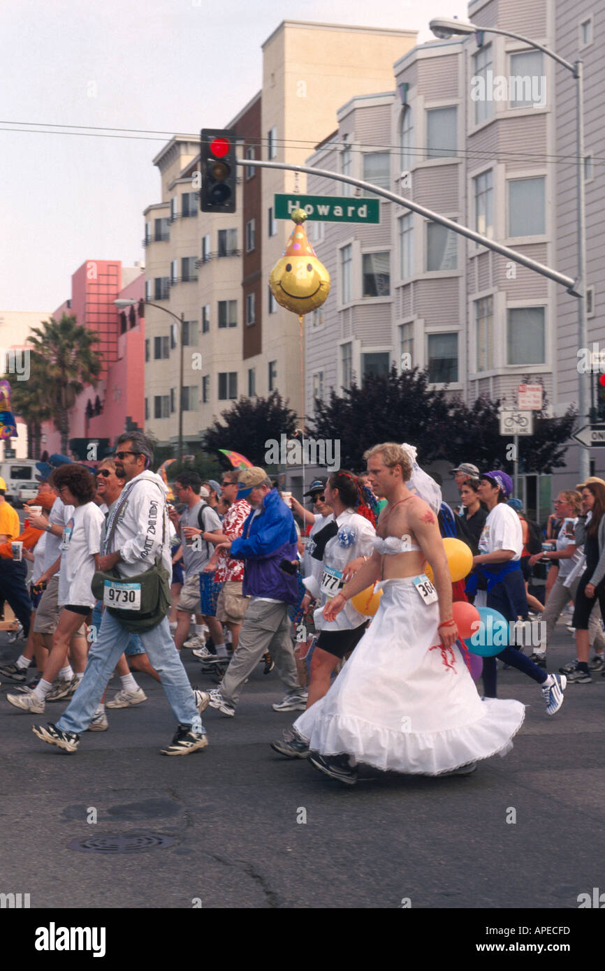 Costume runners and walkers crowd city street during Bay To Breakers