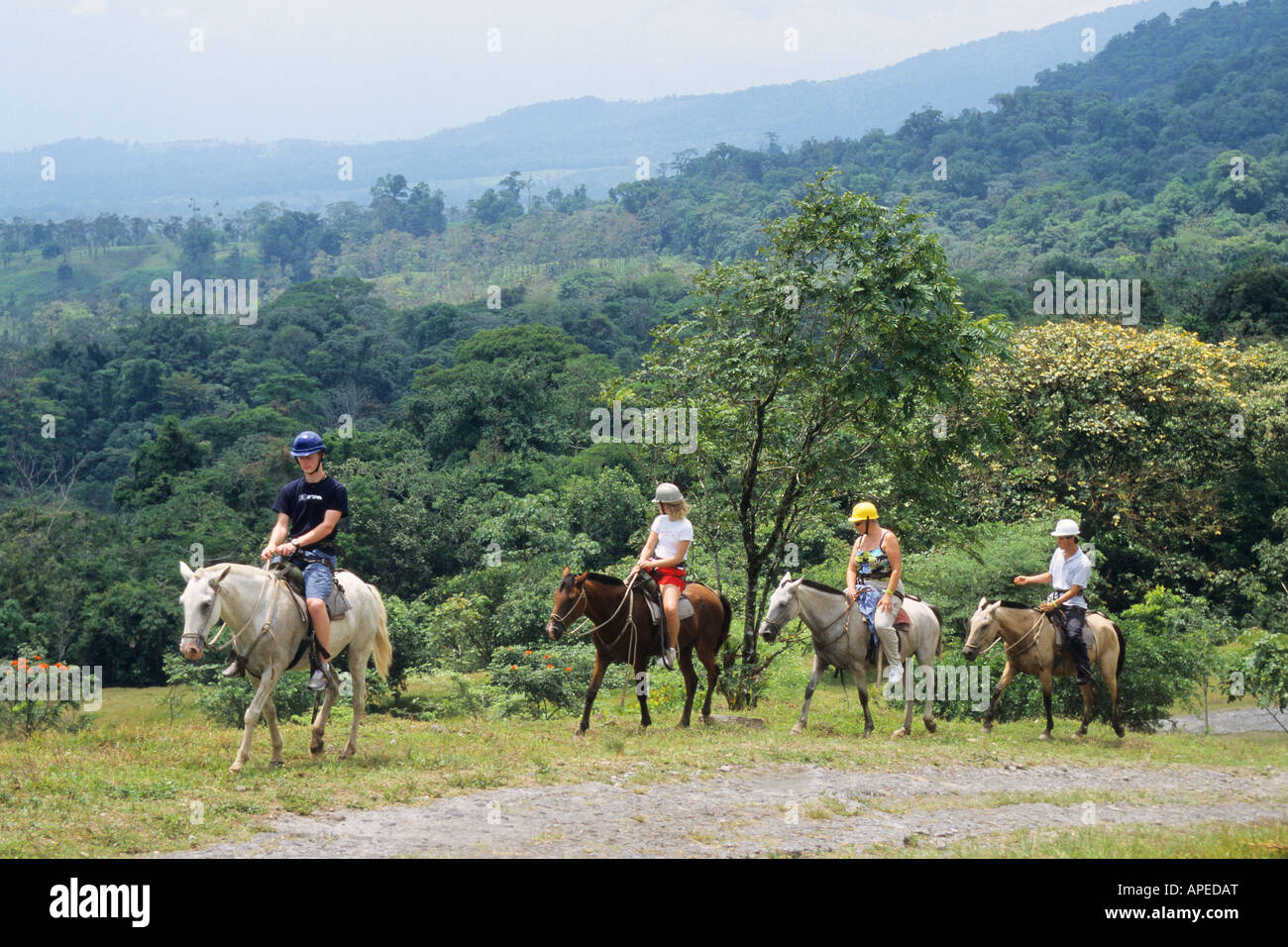Teenage kids on horseback, Arenal Costa Rica Stock Photo Alamy