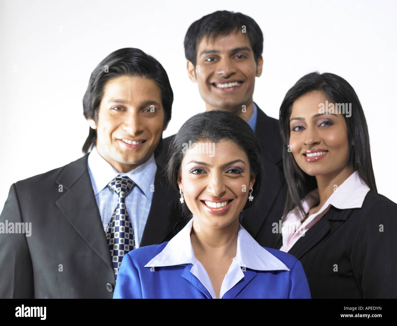 South Asian Indian executive men and women standing together MR Stock Photo