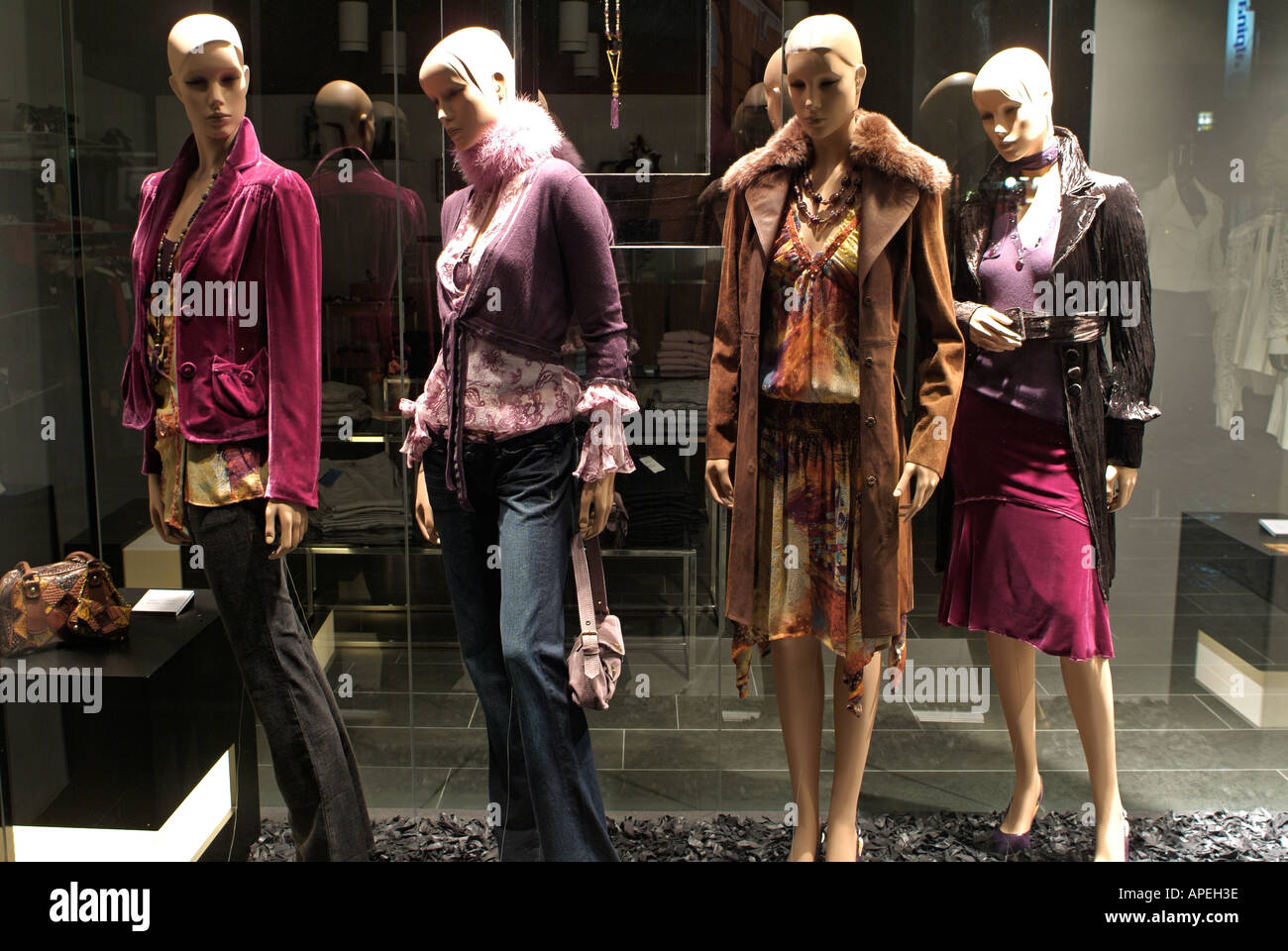 Manikins in the Window of an Exclusive High Street Fashion Retailer Stock Photo