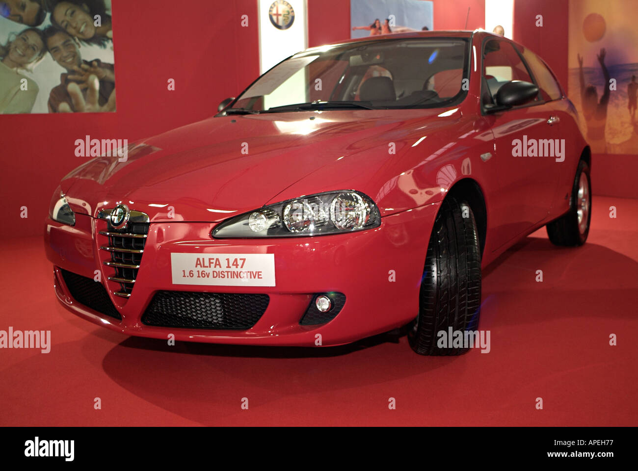 Red Alfa Romeo 147 on Display at a Car Show Stock Photo