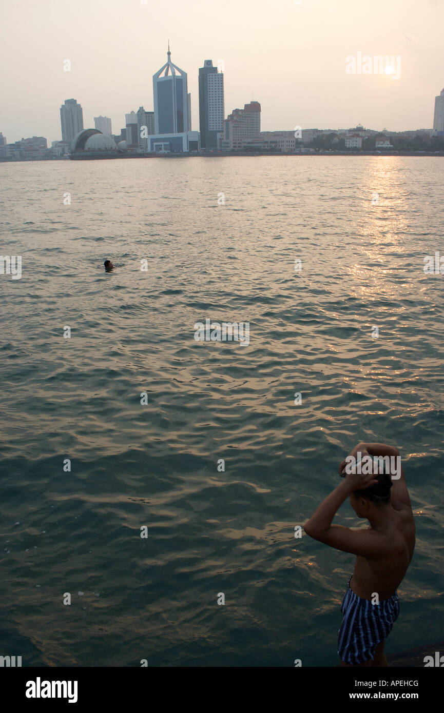 Chinese tourists enjoy a swim Qingdao Shandong China Stock Photo