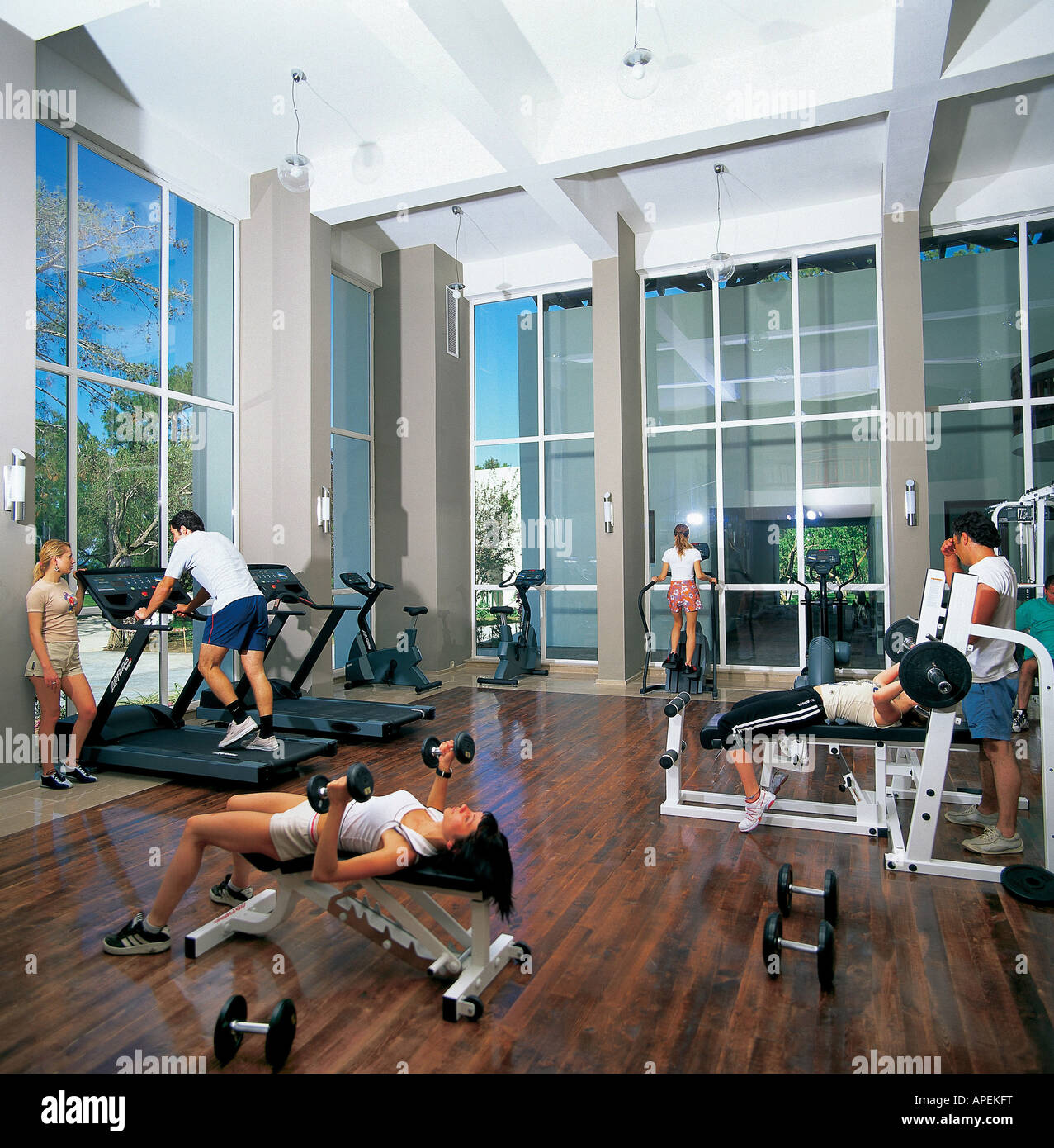 People working out in gym. Stock Photo