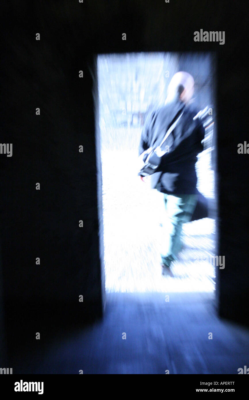 Man Rushing Out A Door Man going out the door Stock Photo - Alamy