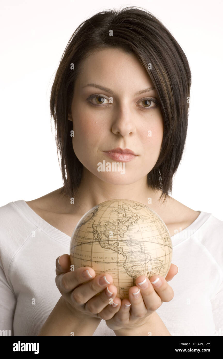 Hand in hand holding a globe hi-res stock photography and images - Alamy