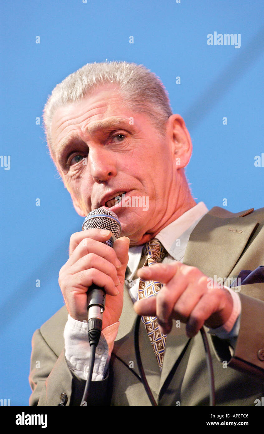 Vocalist Georgie Fame singing with his Big Band at Brecon Jazz Festival Powys Wales UK Stock Photo