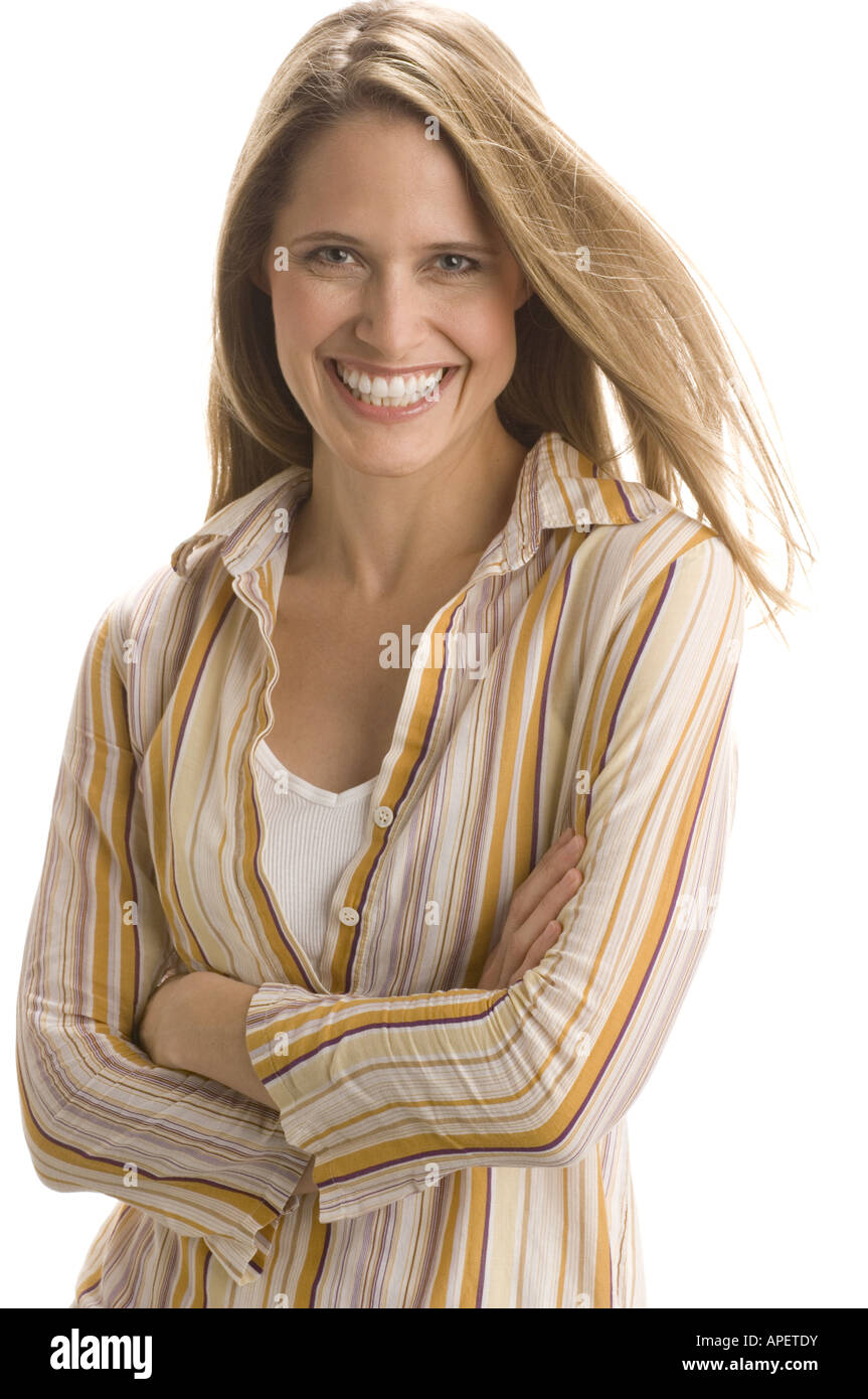 Studio portrait of young blond woman in striped shirt Stock Photo - Alamy