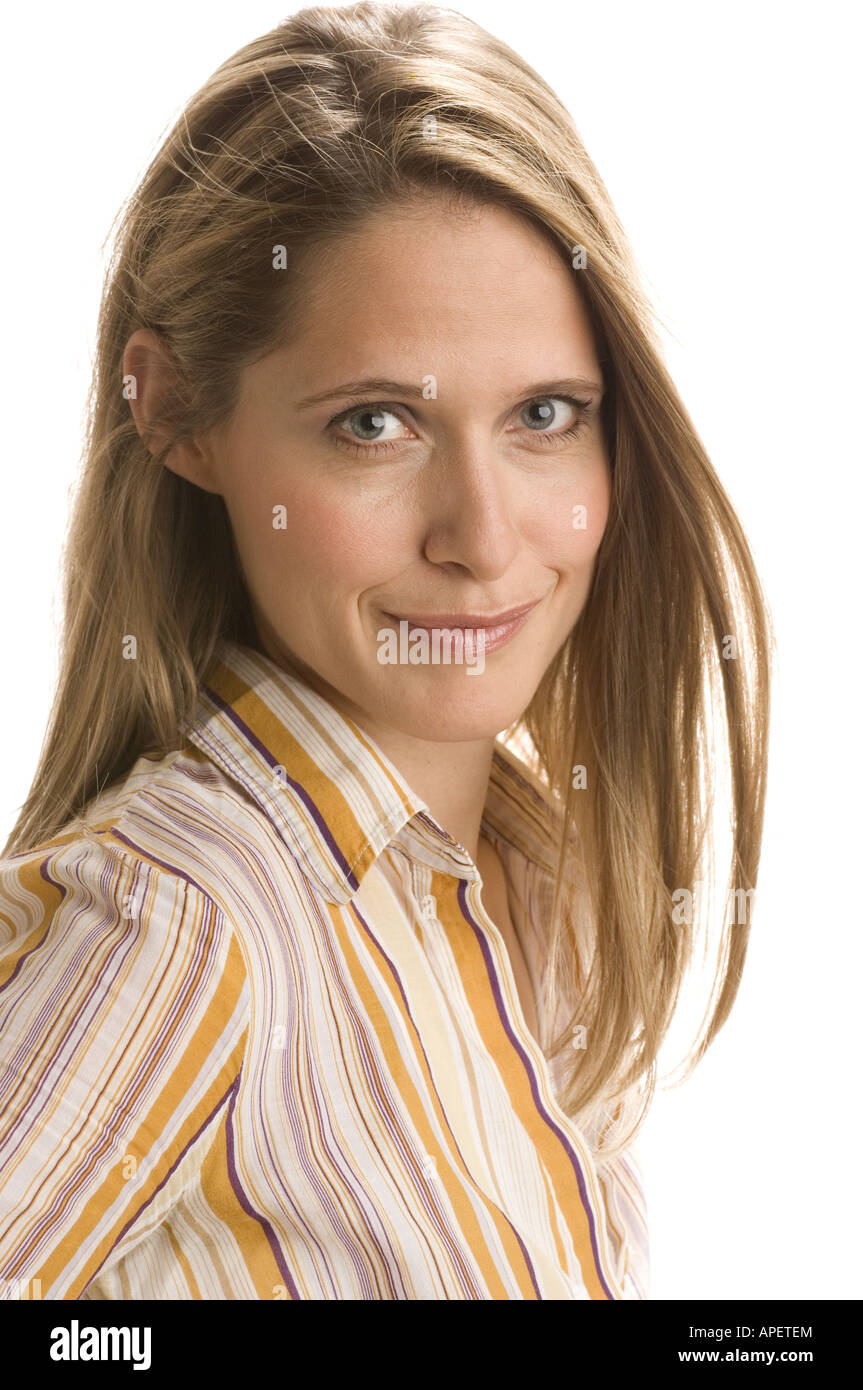 Studio portrait of young blond woman in striped shirt Stock Photo - Alamy