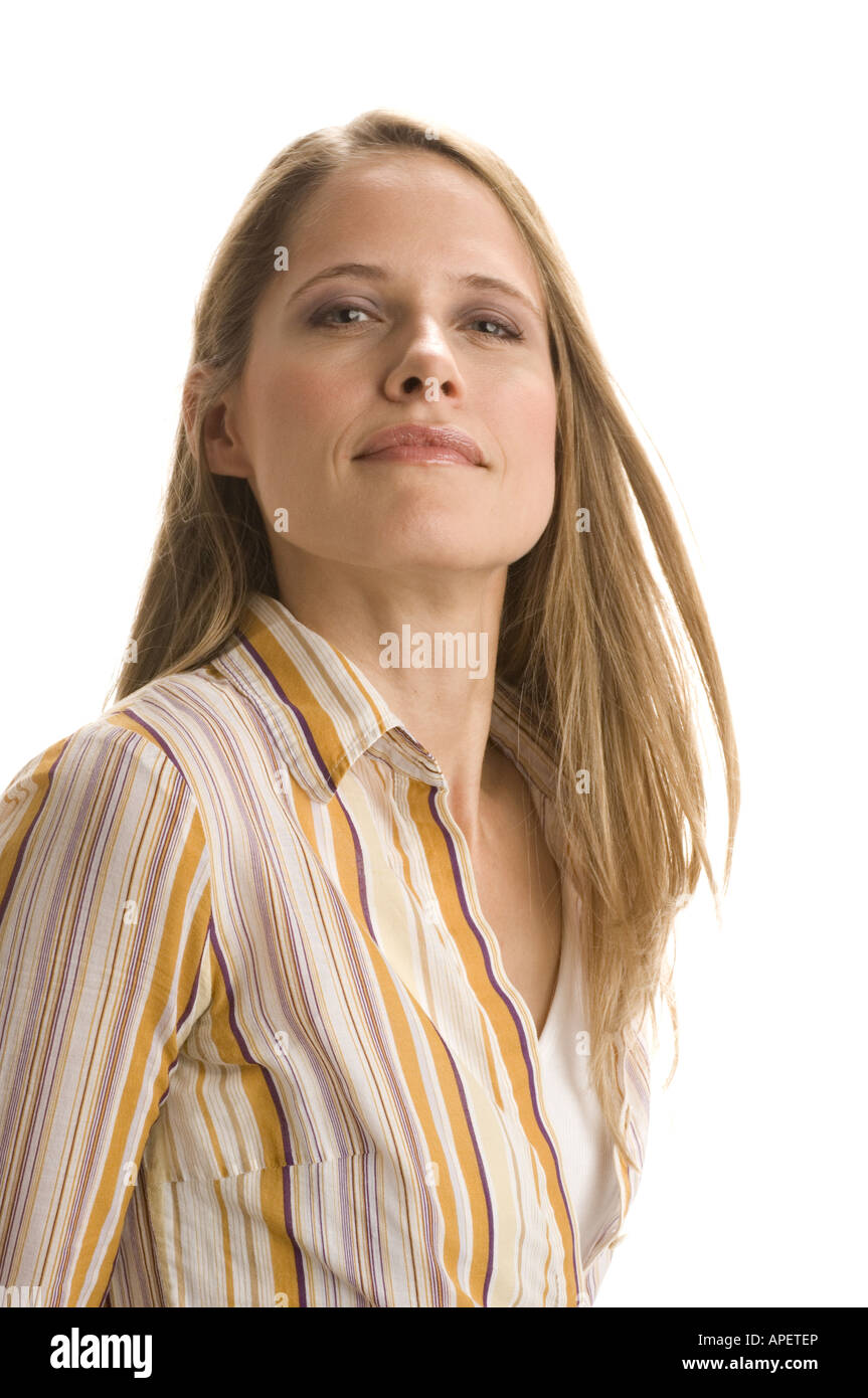 Studio portrait of young blond woman in striped shirt Stock Photo - Alamy
