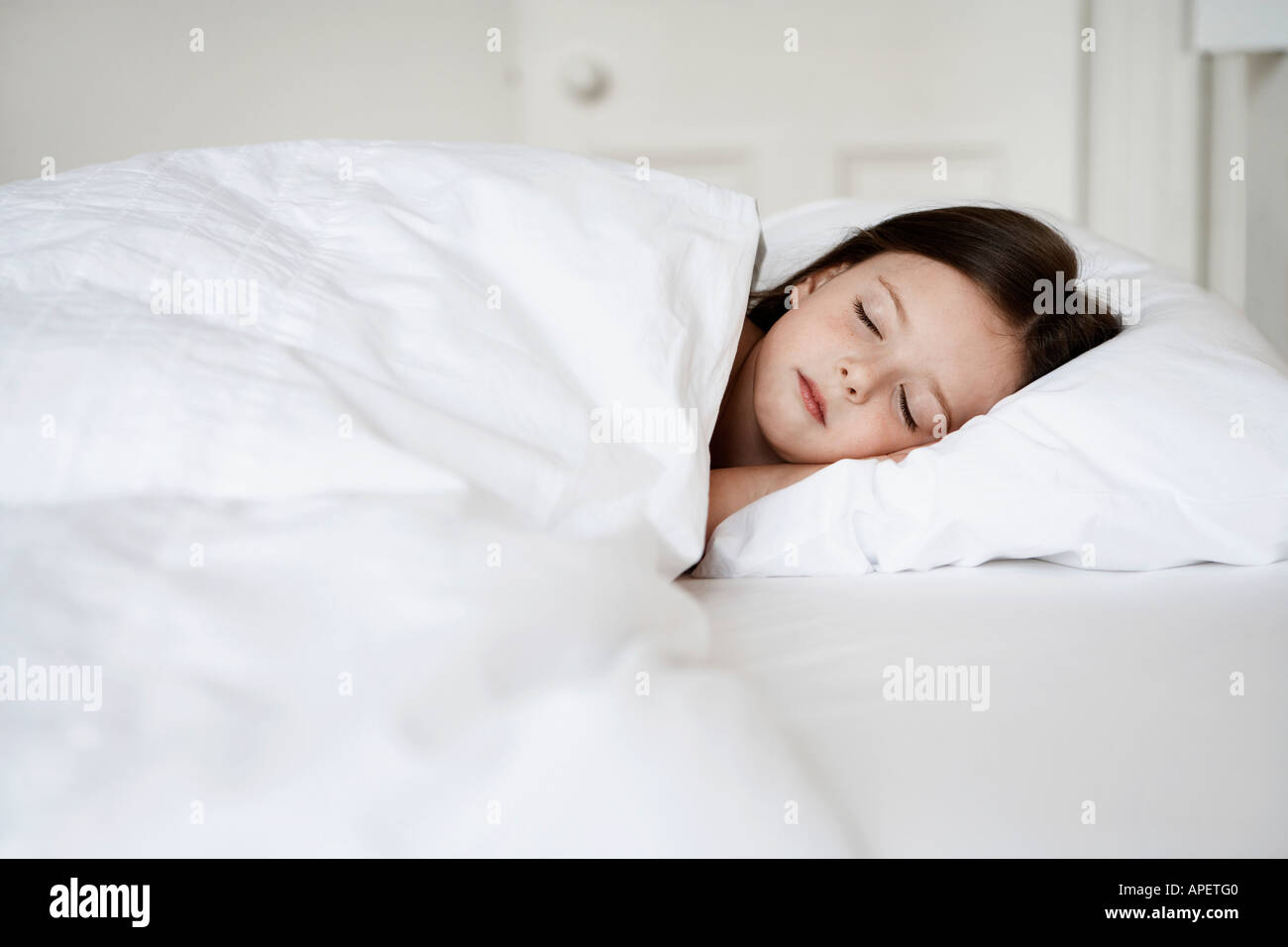 Little Girl Sleeping in bed Stock Photo - Alamy