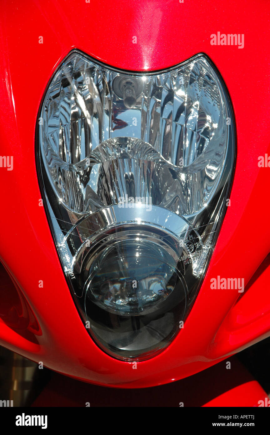 Red motorcycle fairing with headlight Stock Photo Alamy