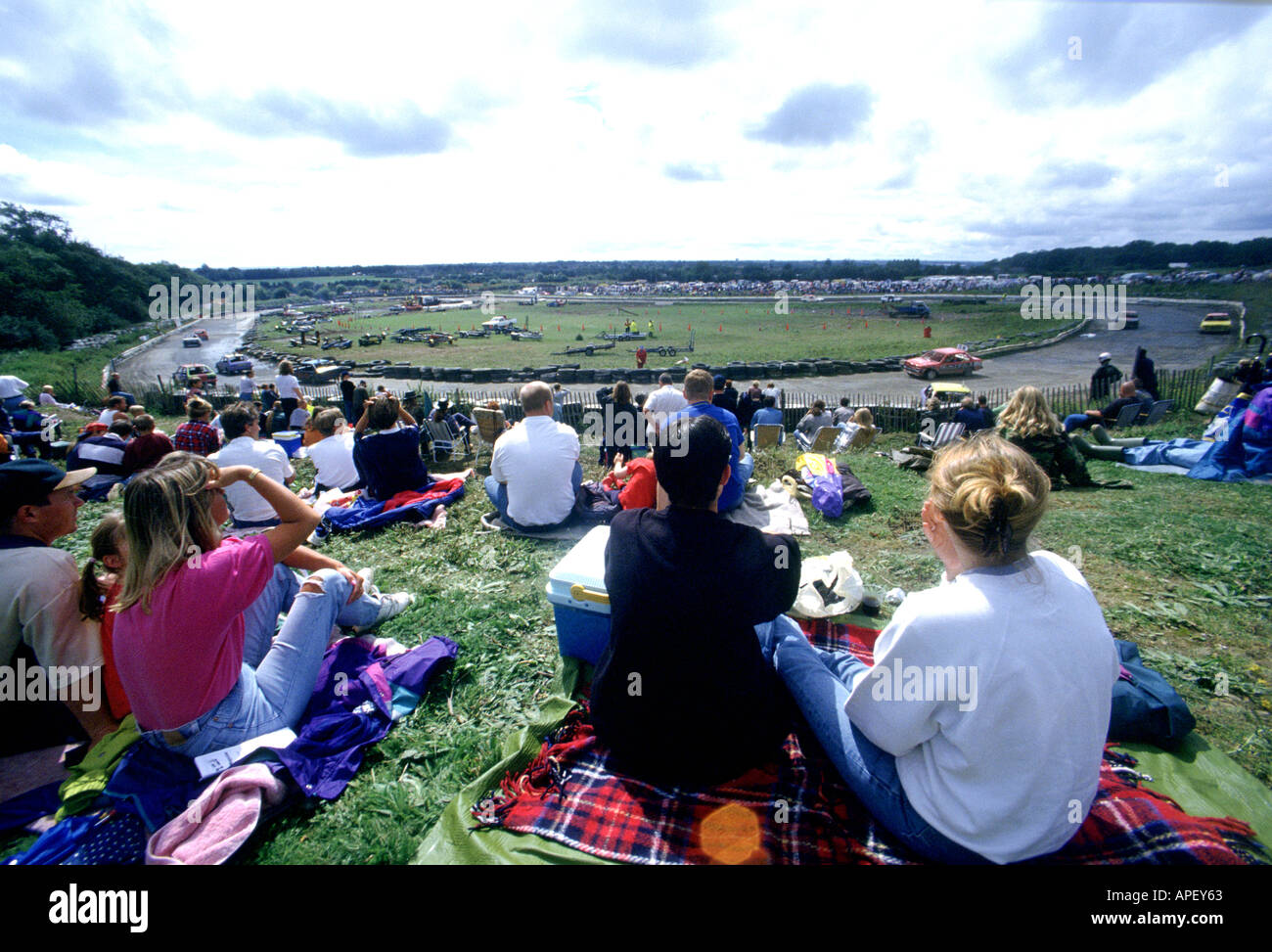 Stock car racing banger junk action fast blur damaged track spectators ...