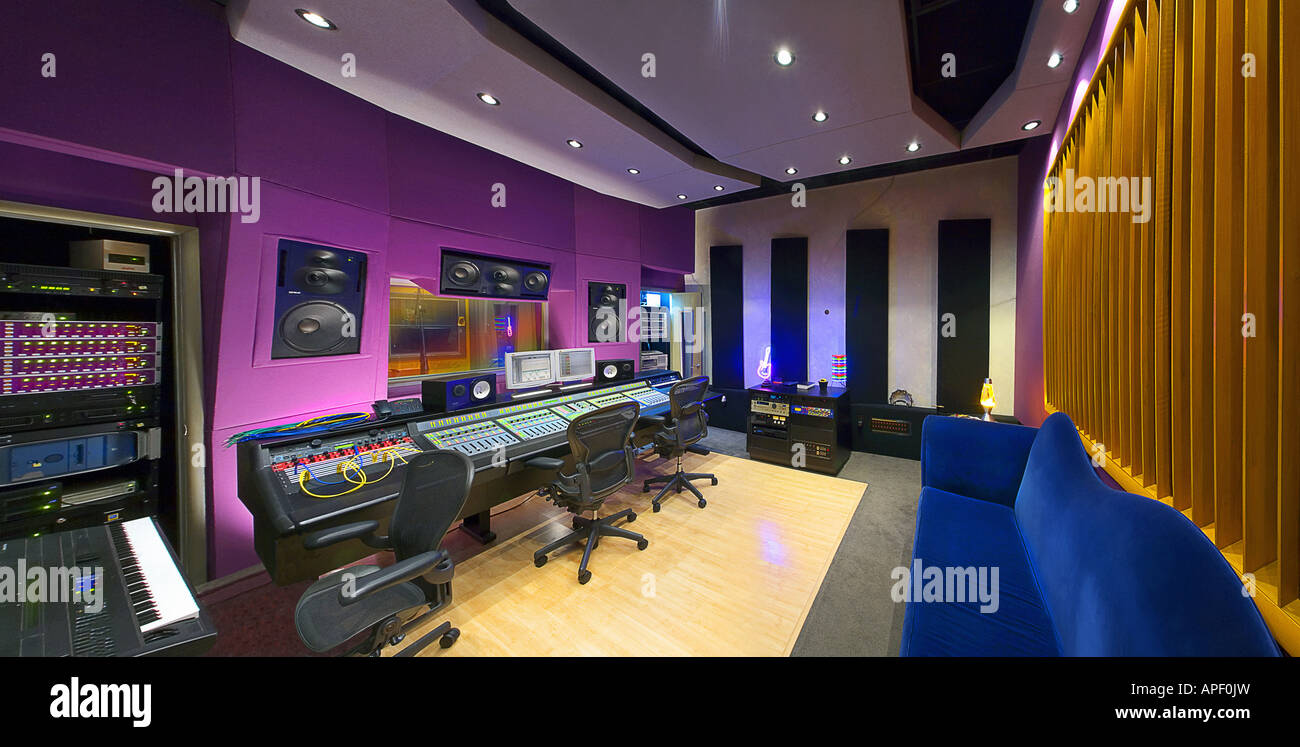 Music recording studio wide angle panoramic shot with array of control ...