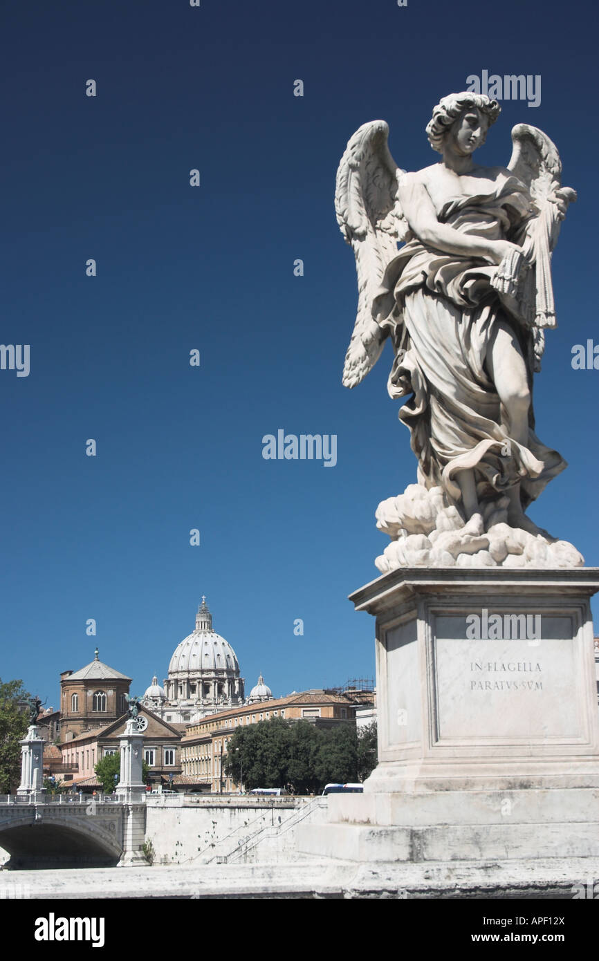 Statue on a Bridge in Rome with St. Peter's Basilica in the background