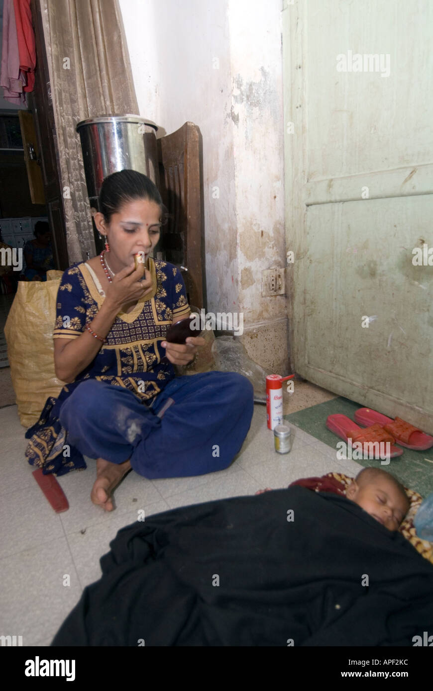 Sex workers dress in their work clothes and put on make up in the late  afternoon before work Stock Photo - Alamy