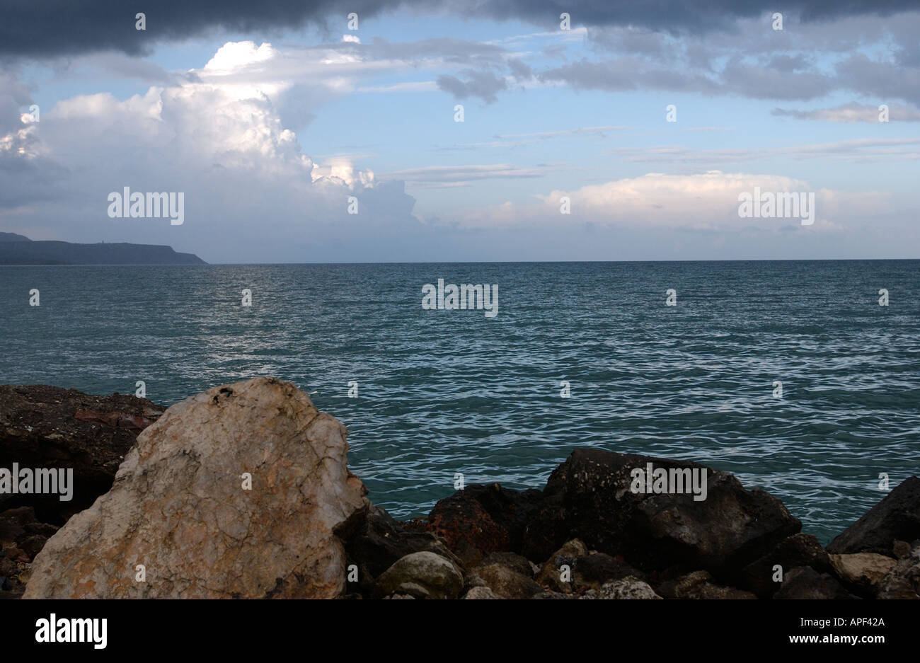 Storm clouds clear over Souda Bay Crete in November Stock Photo