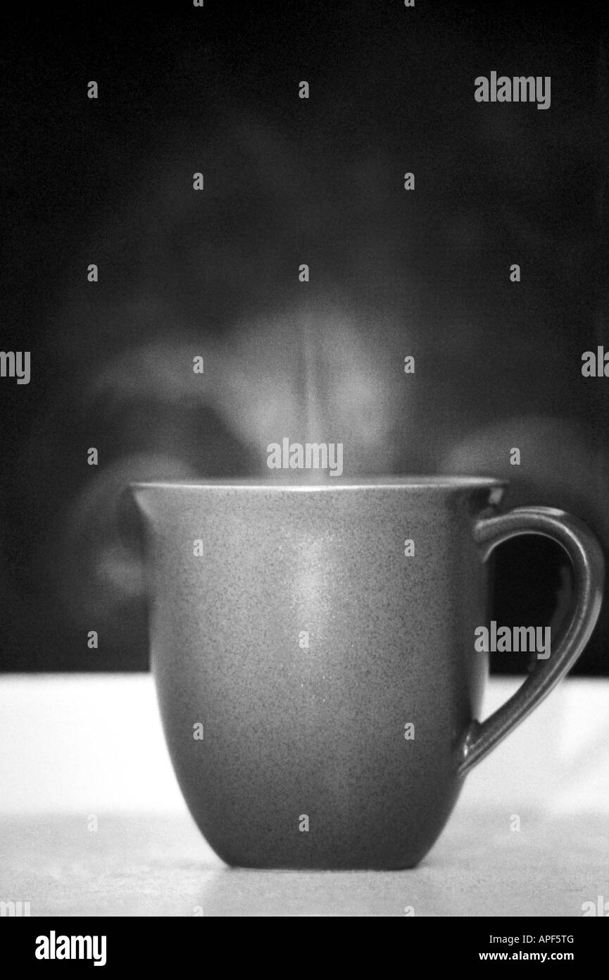 A mug of steaming hot tea Stock Photo Alamy