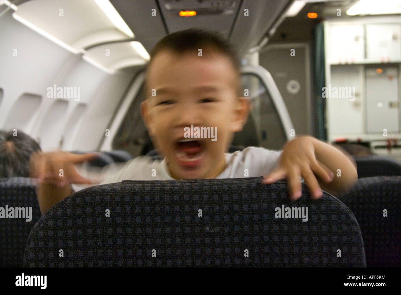 Annoyed airplane seat hires stock photography and images Alamy