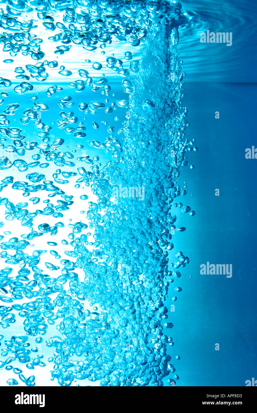 air bubbles water jet gets through water surface Stock Photo Alamy