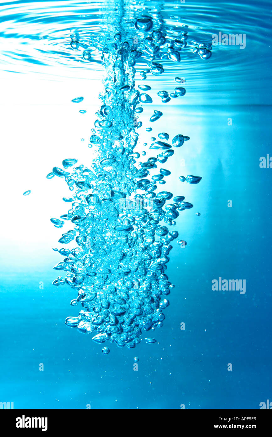 air bubbles water jet gets through water surface Stock Photo Alamy