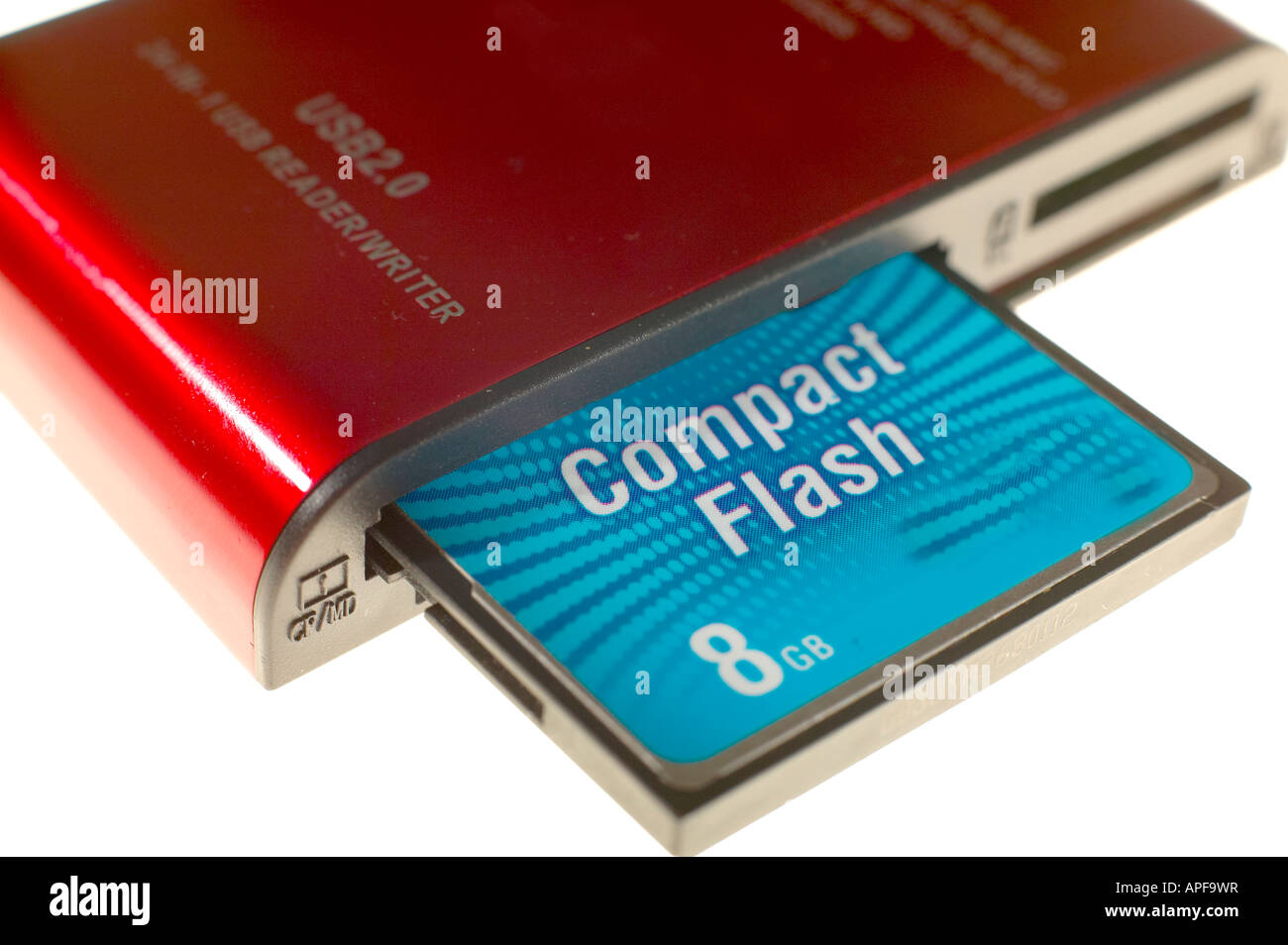 Compact flash card reader with 8 GB card isolated on white background ...
