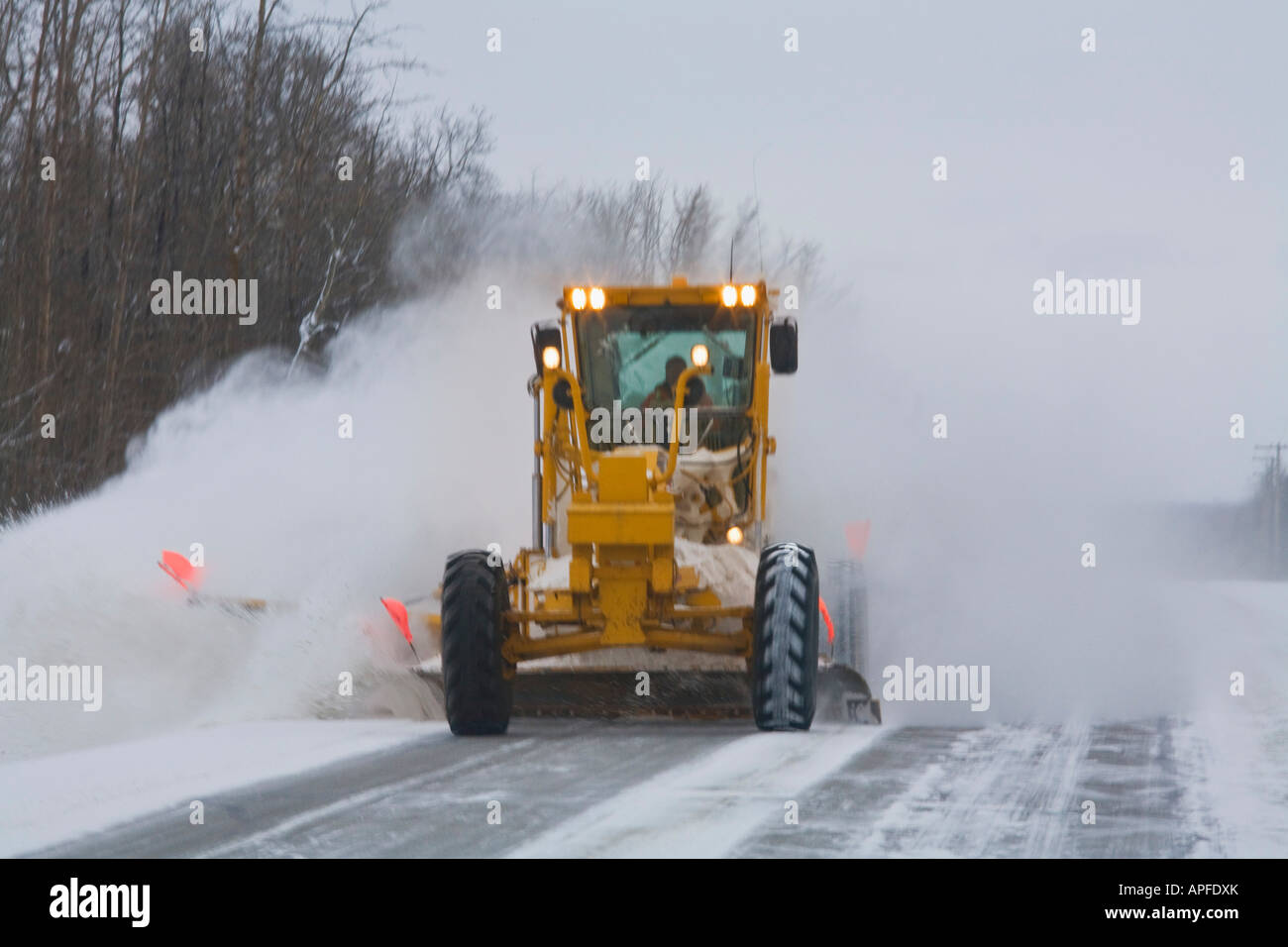 Snow plow clearing highway Stock Photo Alamy