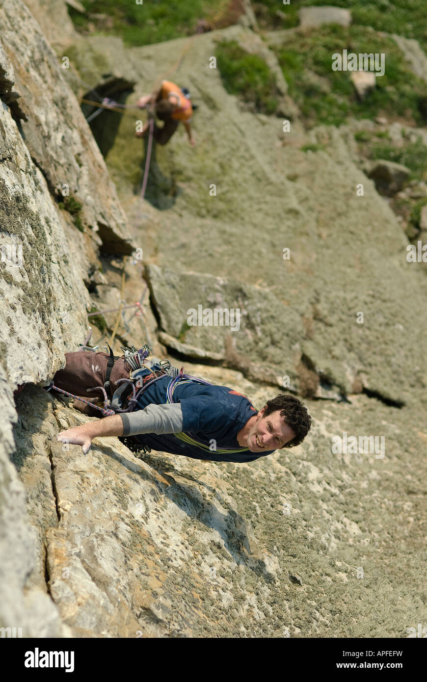 rock Climbing on sea Cliffs of wales Stock Photo