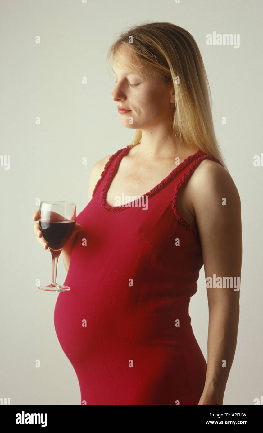 pregnant woman drinking alcohol Stock Photo Alamy