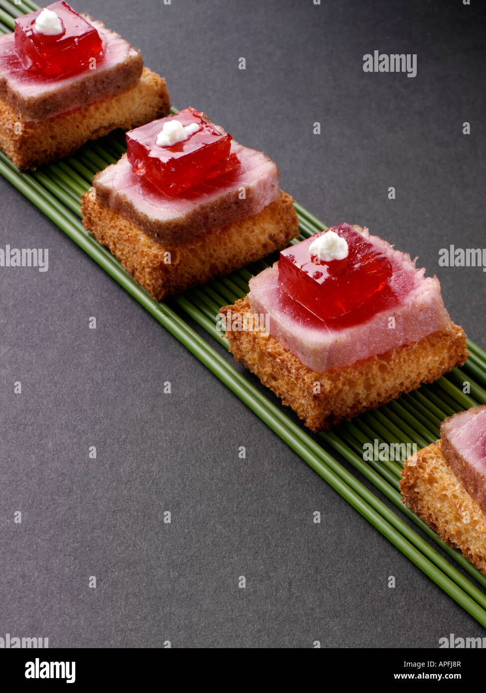 Tuna chilli jelly canapes editorial food Stock Photo Alamy