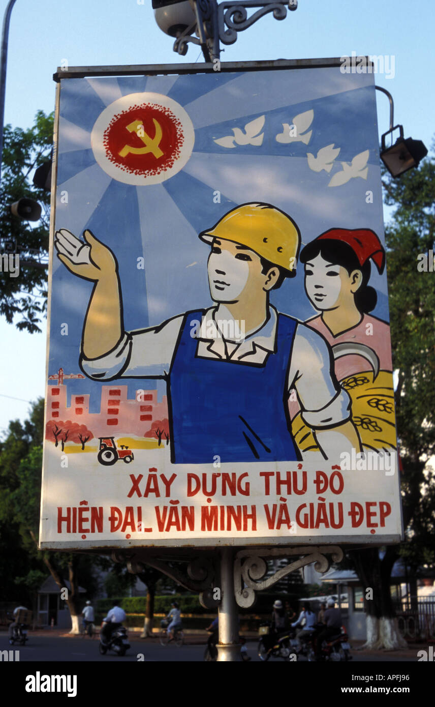 A socialist poster on the streets of Hanoi, Vietnam. Stock Photo
