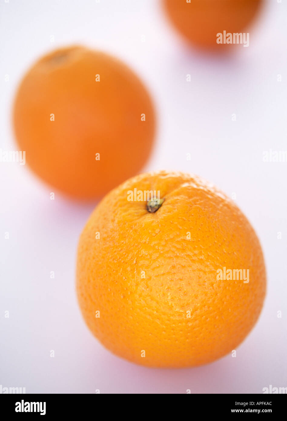 Three Oranges on white background Stock Photo
