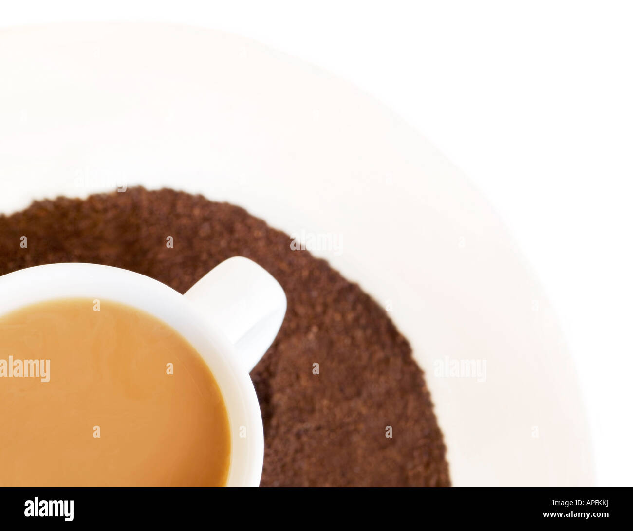 Cup of coffee and ground coffee Stock Photo