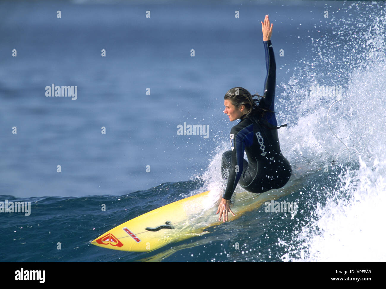 Surfing girl action hi-res stock photography and images - Alamy