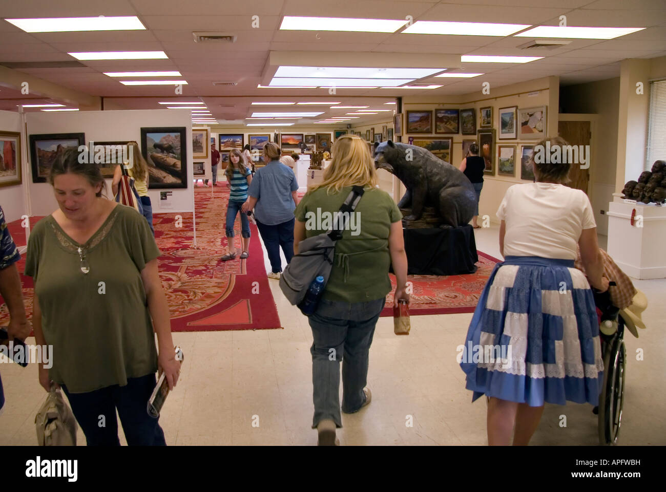 People milling about & appreciating the many works of art on display at this Art Exhibit at the Utah State Fair in SLC, Ut., USA Stock Photo