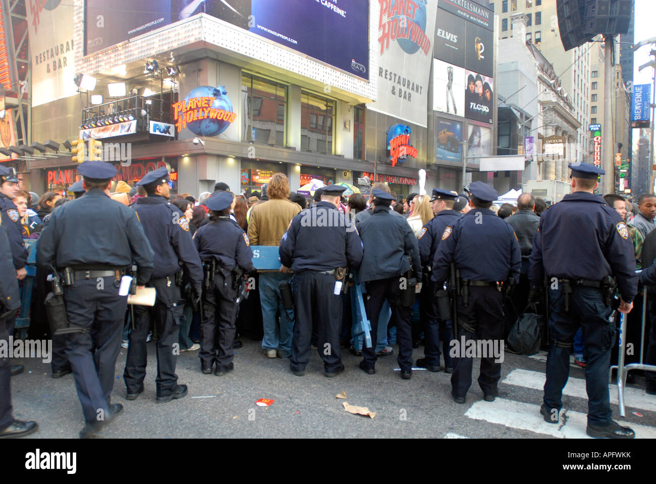 NYPD officers exercise crowd control in Times Square on New Year s Eve going into 2008 Stock Photo