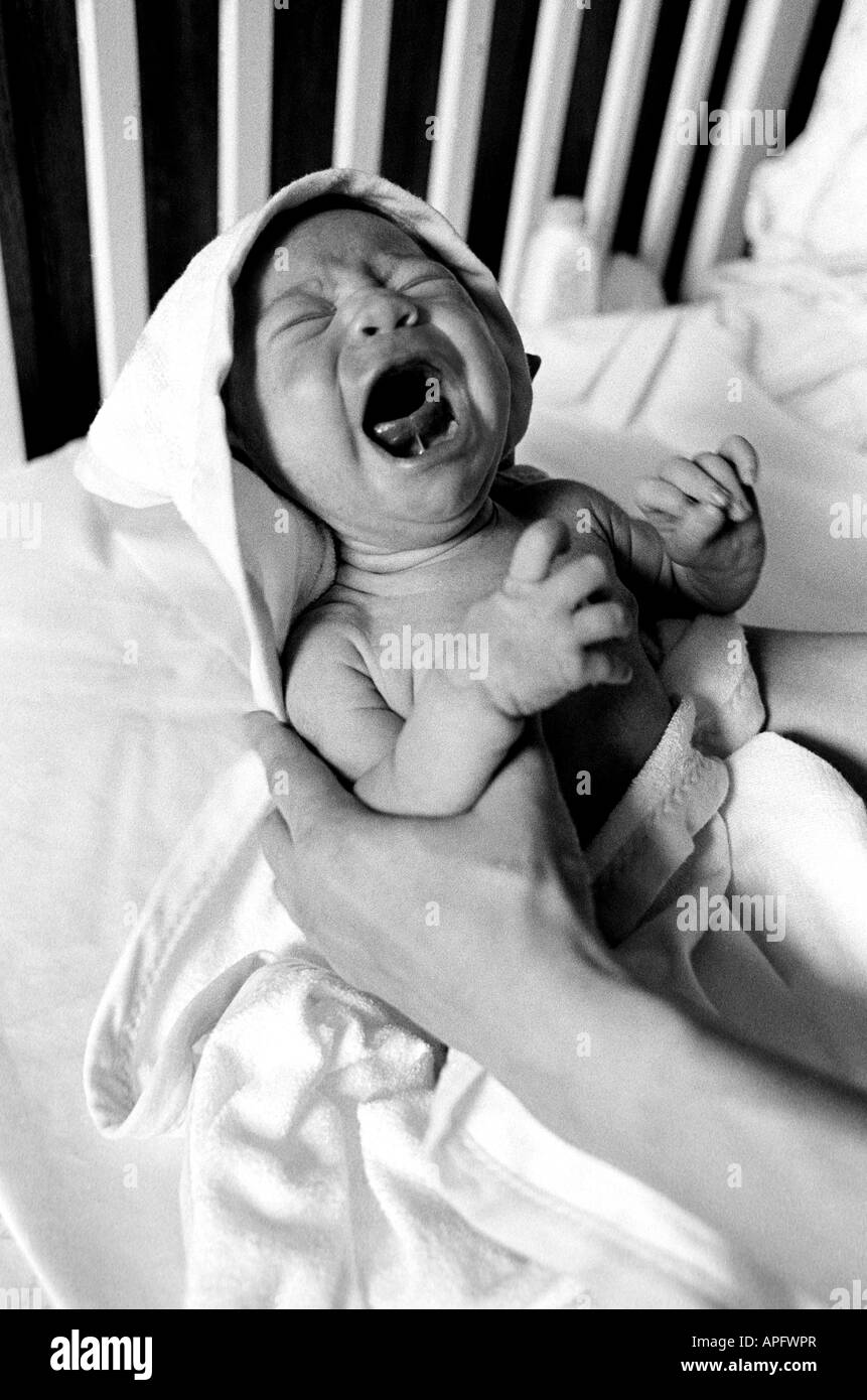 Crying infant baby girl Stock Photo