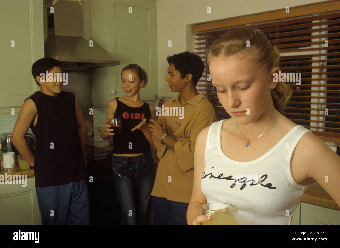 girl feeling left out at a party Stock Photo