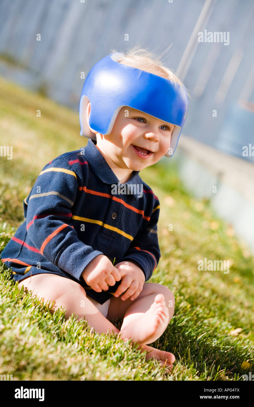 Boy with reshaping helmet Stock Photo Alamy